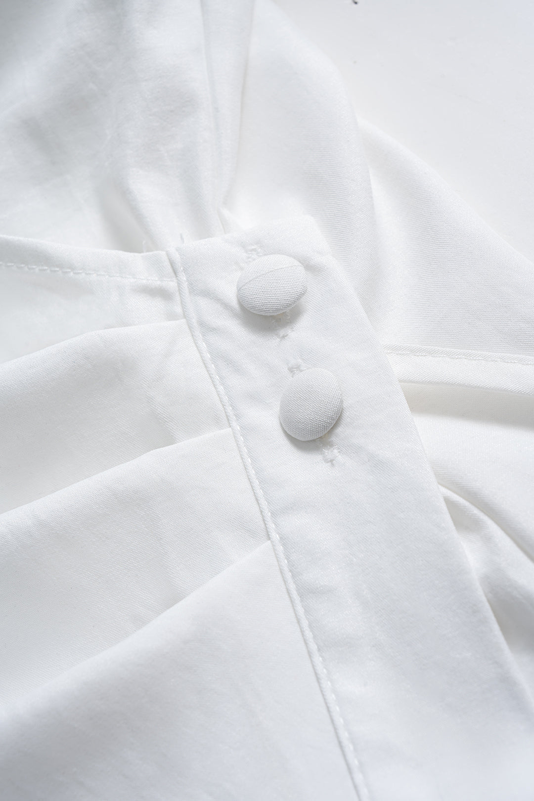 Halenka s dlouhým rukávem, asymetrickým zadním dílem a výstřihem do V